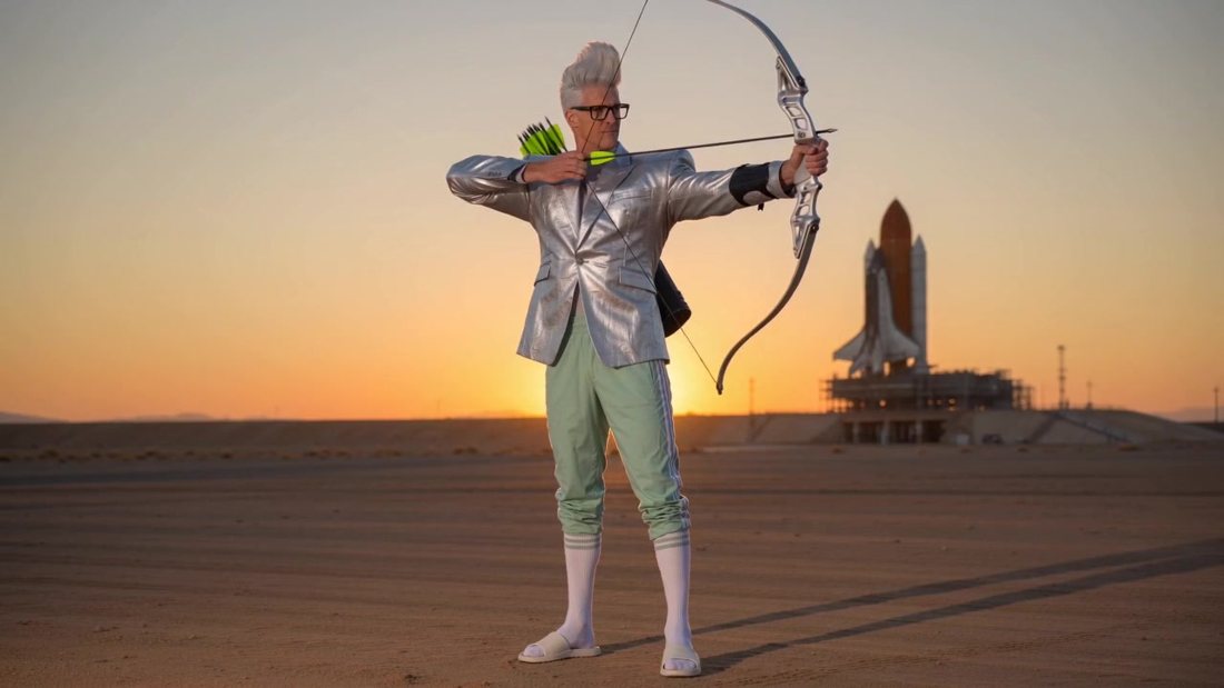 Max Orbit drawing his bow